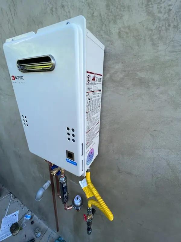 Tankless water heater installation for Brookside Village homes